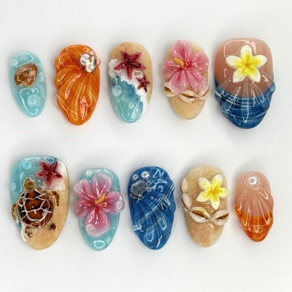 NEWSPIED front packaging showing 24-piece beach press-on nails and benefits