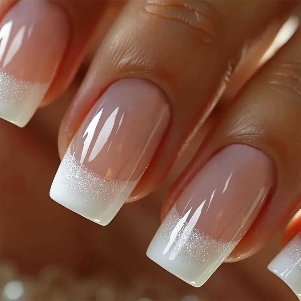 NEWSPIED front packaging showing 24-piece silver glitter French-tip nails and contents, easy selection