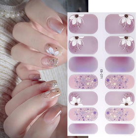NEWSPIED hands wearing stickers in lifestyle setting showing ready-to-wear polish
