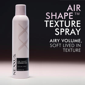 Model applying Nexxus spray for instant airy volume and touchable, matte texture
