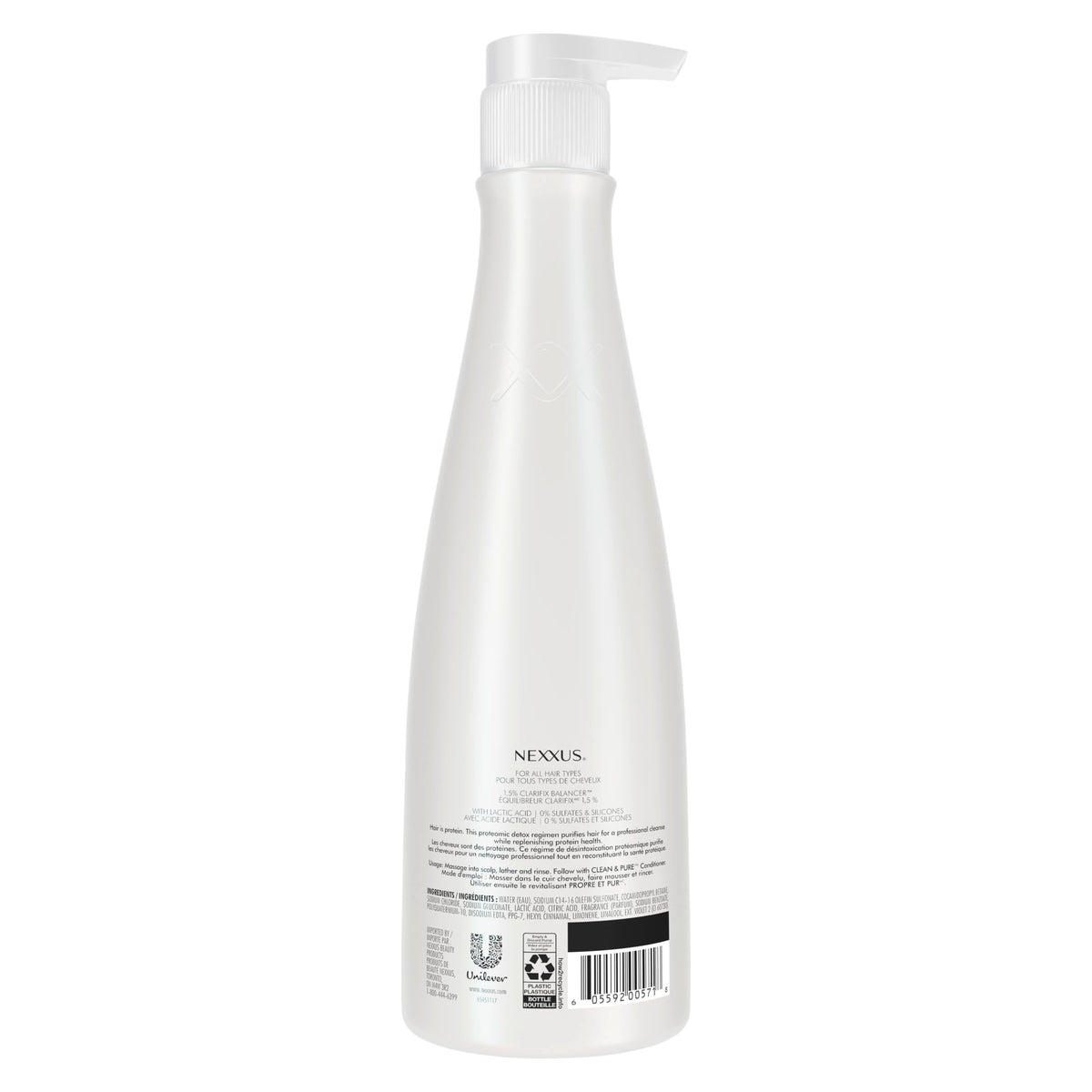 Nexxus bottle next to hand showing 13.5 oz scale and travel clarity