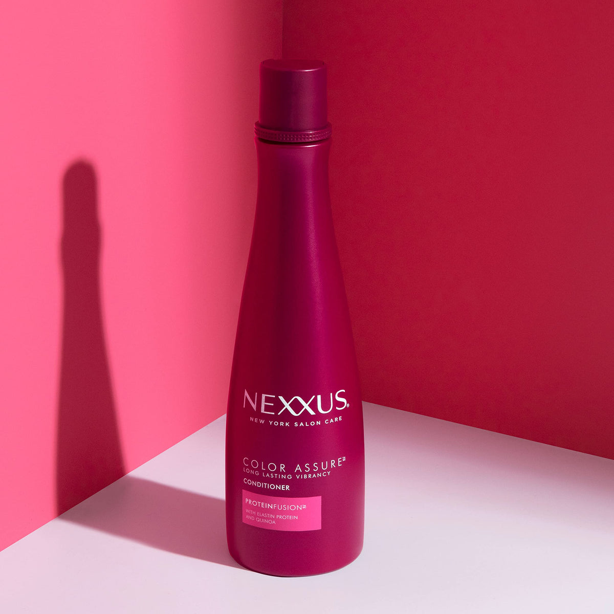 Nexxus conditioner cream close-up showing moisturizing texture and repair
