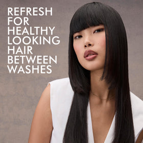 Nexxus can on bathroom shelf in lifestyle setting suggesting daily use