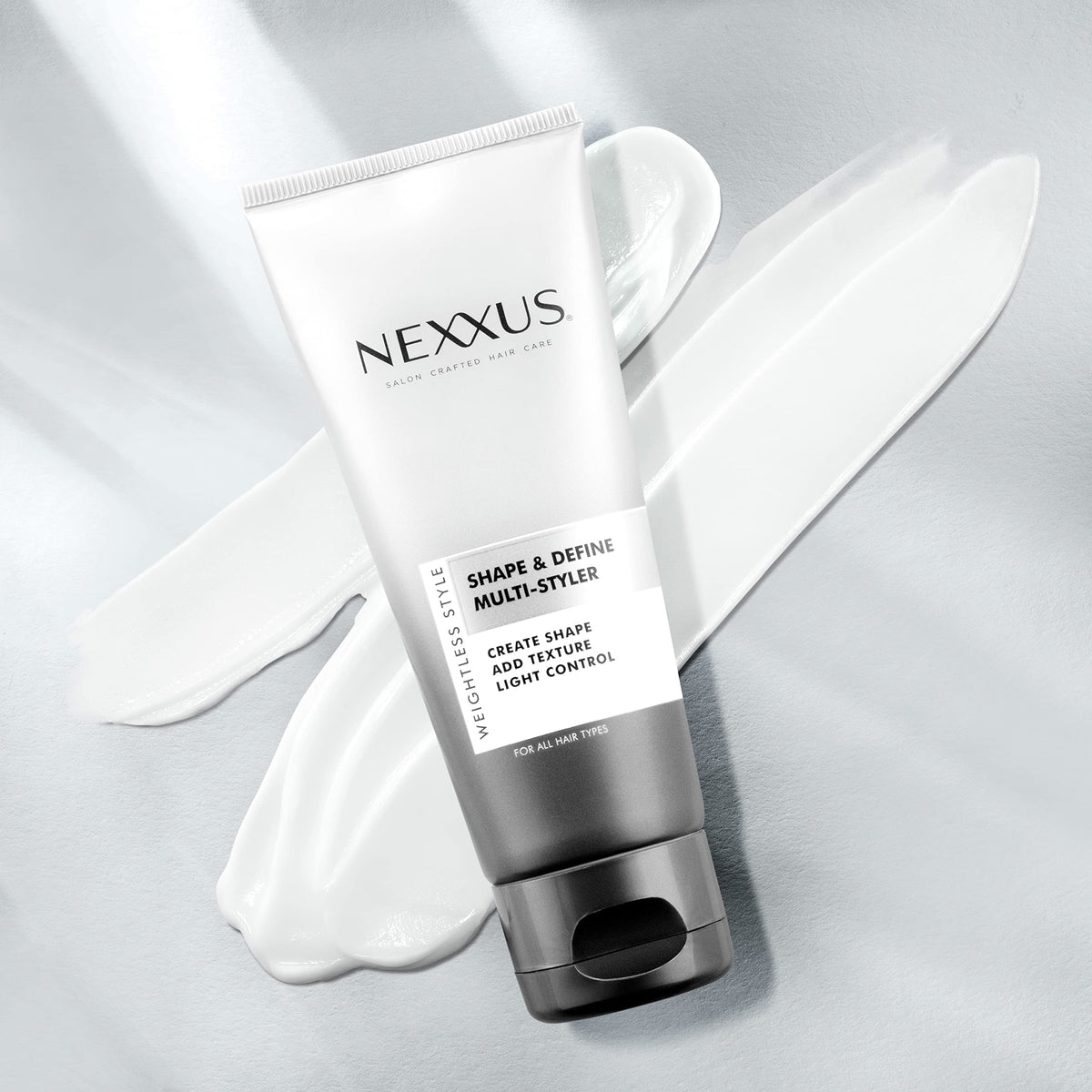 Nexxus close-up of cream texture highlighting weightless spreadability