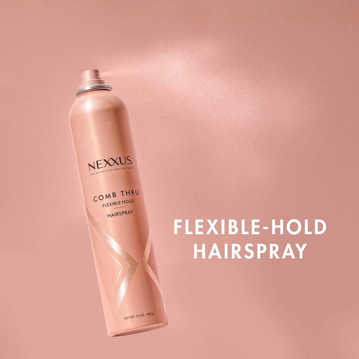 Nexxus spray being applied to a voluminous blowout for lasting soft hold and shine