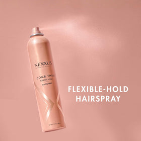 Nexxus spray being applied to a voluminous blowout for lasting soft hold and shine