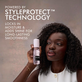 Nexxus oil texture on fingertips showing lightweight absorbent finish