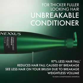 Nexxus conditioner being applied to hair mid-lengths for reduced breakage