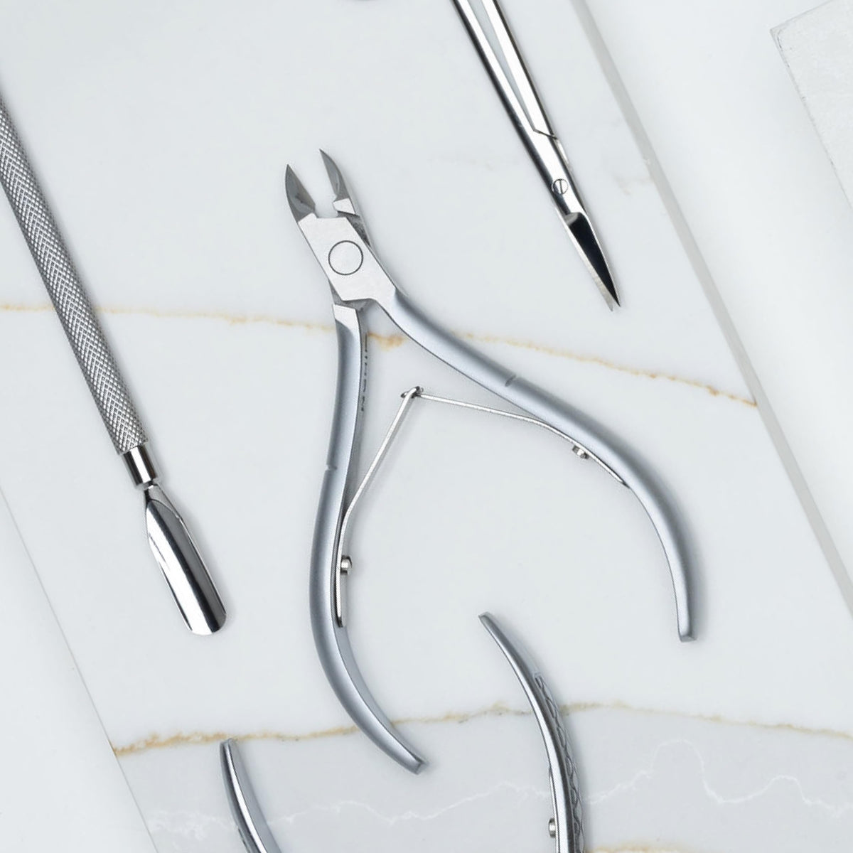 Nghia cuticle nipper size comparison with ruler to show scale and portability