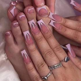 NHIXK hand model wearing short square nails showing instant polish