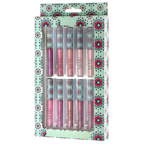 Nicole Miller glosses inside purse with essentials, perfect for on-the-go touch-ups