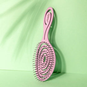 Ninabella brush detangling curly hair smoothly without pulling or frizz