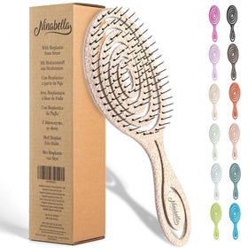 Ninabella front view cream brush showing compact design and gentle profile