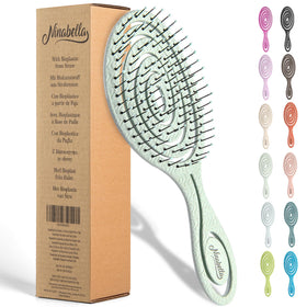 Ninabella front view of green detangle brush showing whole design and comfort