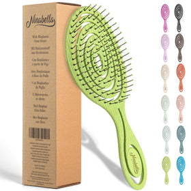 Ninabella front view of lime green brush showing compact design and color benefits