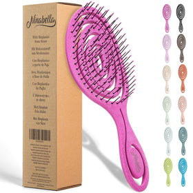 Ninabella front view of pink mini spiral brush showing compact design and easy grip