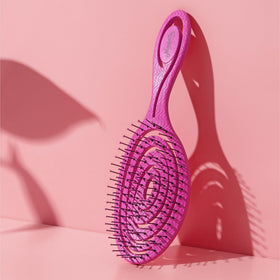 Ninabella brush used on wet hair in shower offering tangle-free conditioning benefit