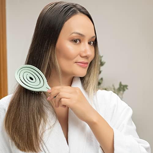 Ninabella brush gently detangling wet hair for safer post-wash care