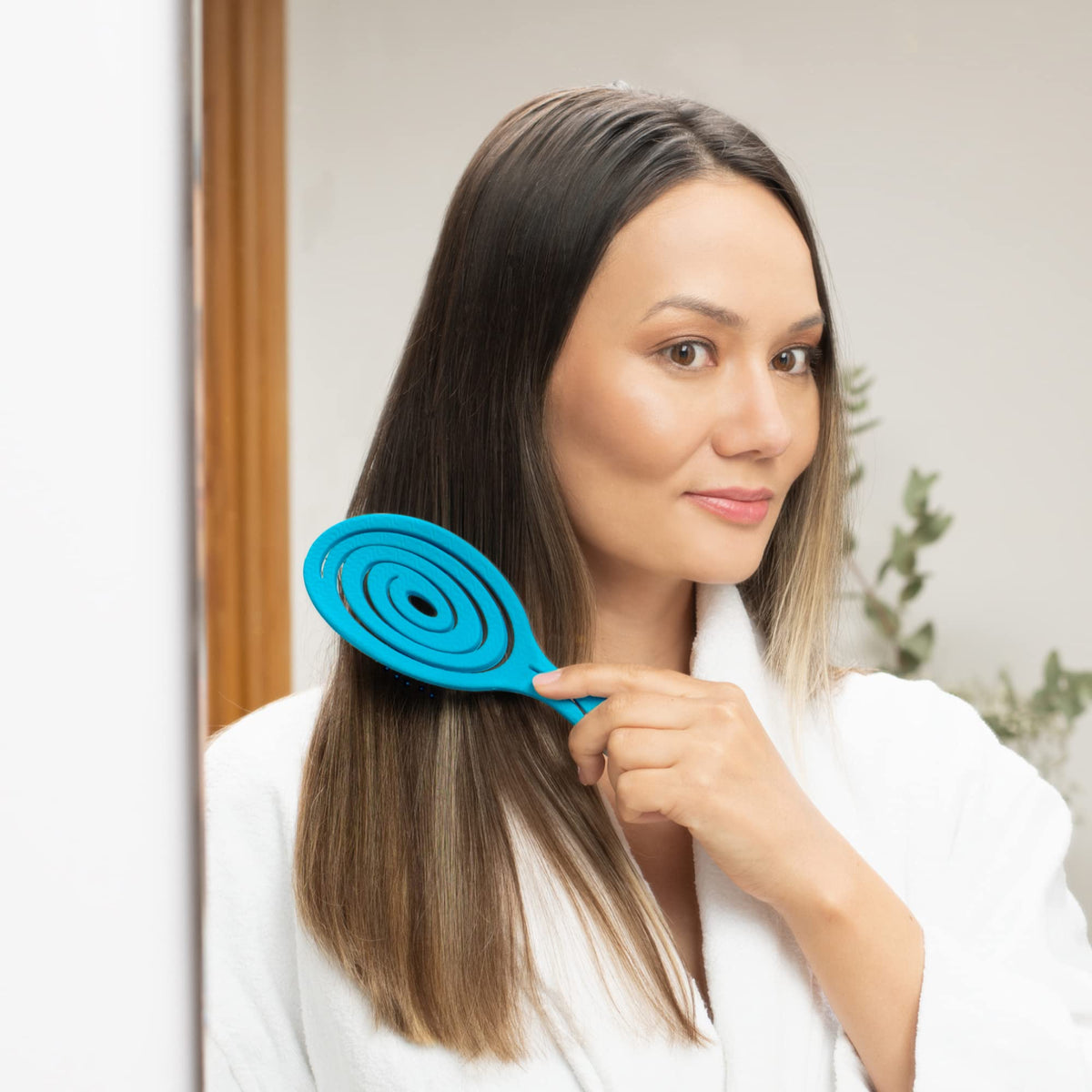Ninabella brush used on wig and extensions to preserve texture