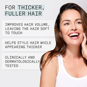 NIOXIN applying mousse at roots for lift and styling support
