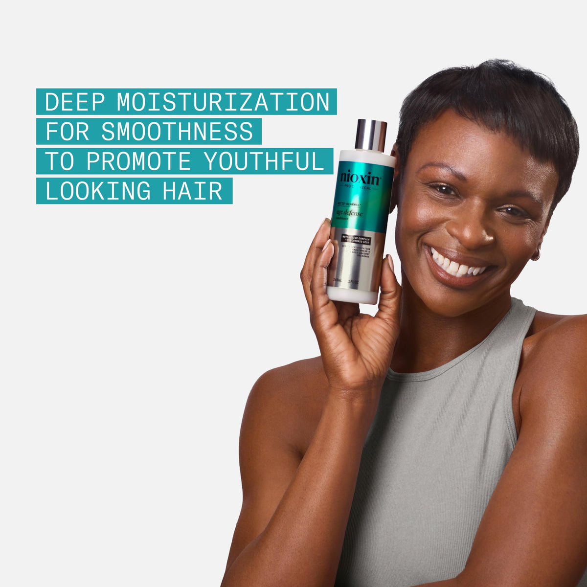 NIOXIN conditioner being dispensed onto palm for controlled application