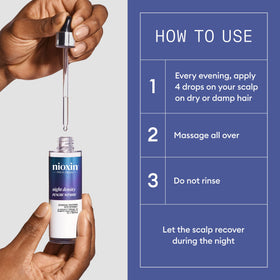 Nioxin serum in hand being applied to scalp for targeted overnight action