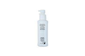NIOXIN stylist applying serum in salon to show professional-grade use