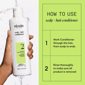Nioxin bottle in hand for size and scale, showing 10.1 fl oz capacity