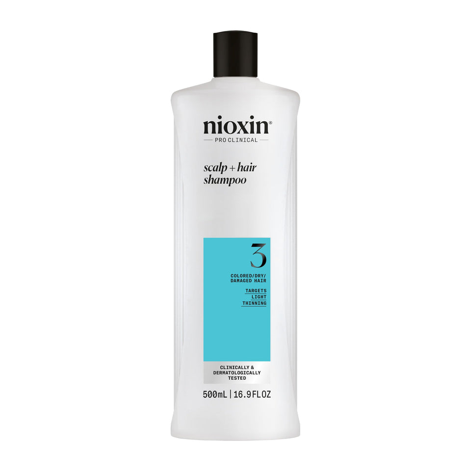 NIOXIN front bottle view showing product packaging and benefit