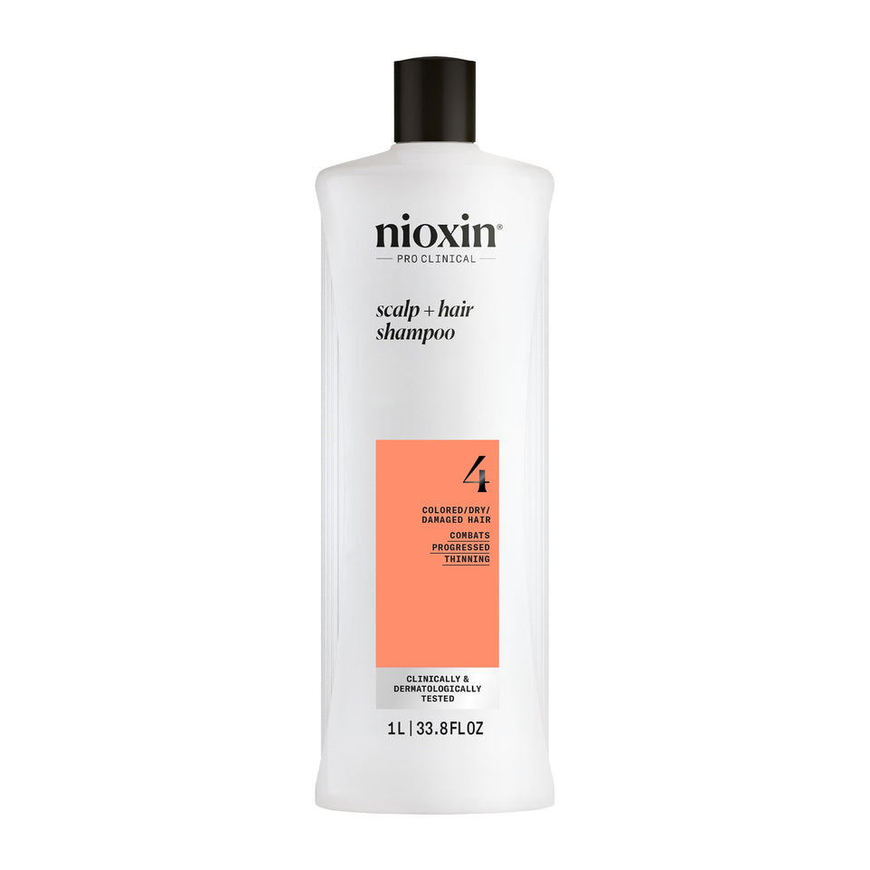 NIOXIN front bottle showing product branding and 33.8 fl oz volume, promoting salon-grade cleansing