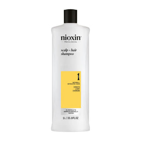 Nioxin bottle front view showing product and clear scalp benefit