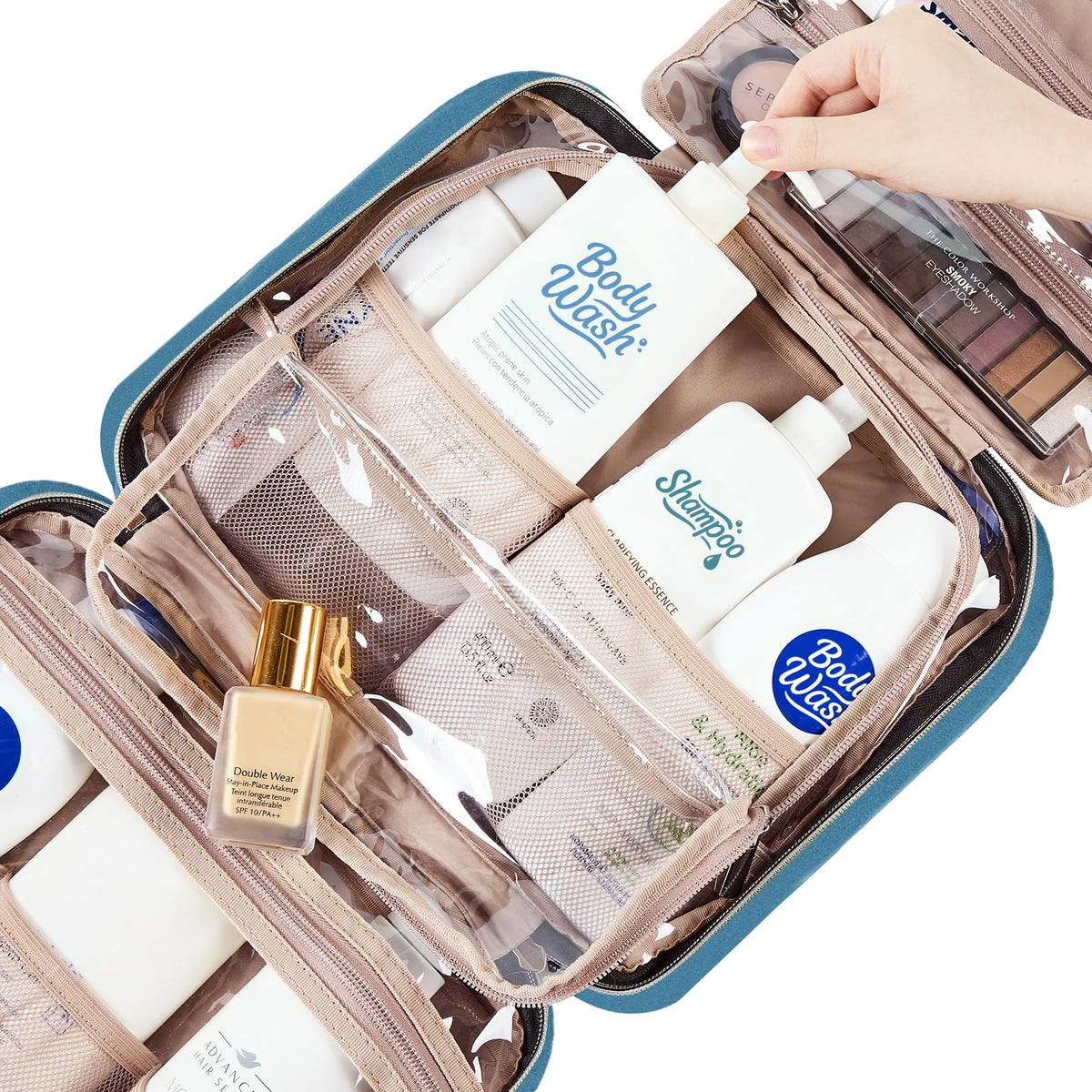 NISHEL close-up of elastic pockets securing brushes and bottles to prevent spills