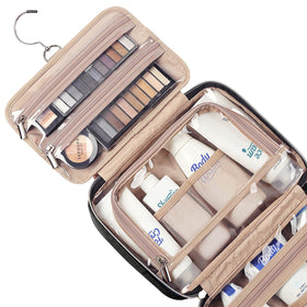 NISHEL elastic pockets and zippered pocket close-up holding bottles securely