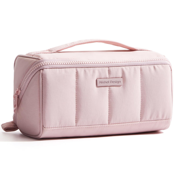 NISHEL front view showing fluffy pink structured exterior and zipper, stylish storage
