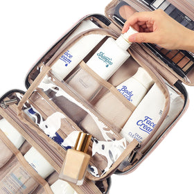 NISHEL size comparison with water bottle illustrating the bag's medium travel capacity