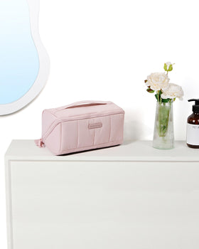 NISHEL top carry handle being held for easy portability on the go