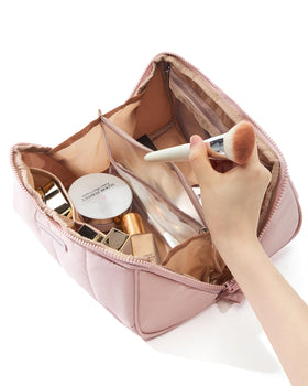 NISHEL zippered side compartment securing liquids and small items during travel