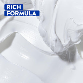Hand applying NIVEA cream showing quick absorption and instant softening effect