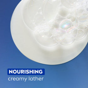 NIVEA bottle with coconut and almond oil visual, emphasizes nourishing oils