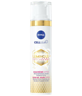NIVEA applying brightening fluid to cheek for even-tone benefit