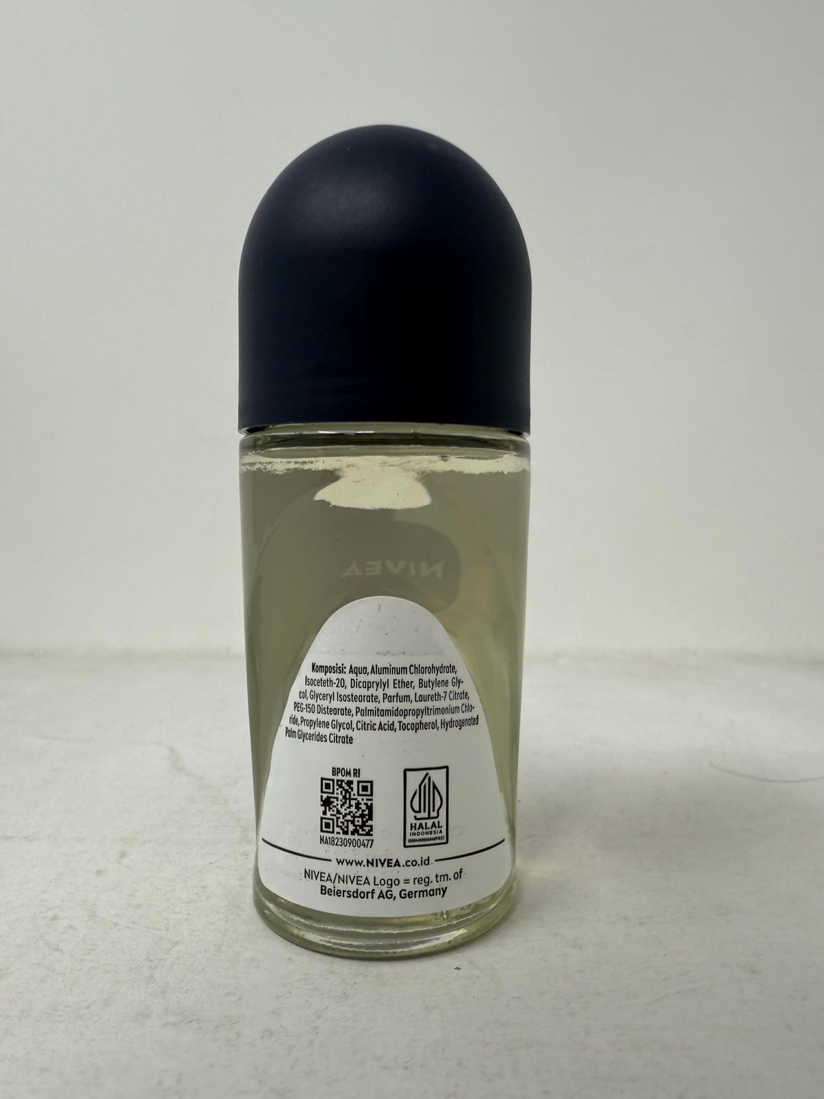 NIVEA Men bottle held in hand illustrating travel-friendly size