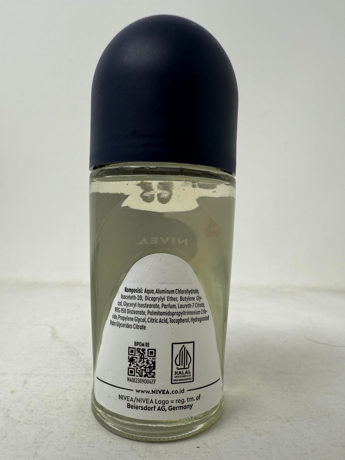 NIVEA Men roll-on beside shirt showing fabric protection from stains