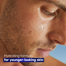 NIVEA MEN serum applied to jawline demonstrating beard‑friendly soothing benefit