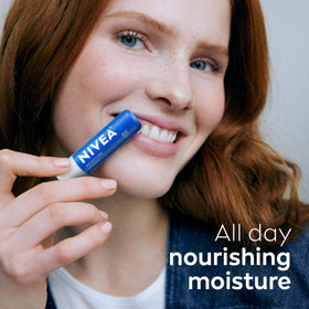 NIVEA products inside a purse to show compact travel convenience
