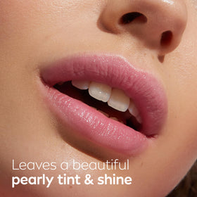 NIVEA model wearing shimmer lip care showing natural pearly tint
