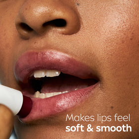 NIVEA balm texture sheen on fingertip showing moisturizing finish