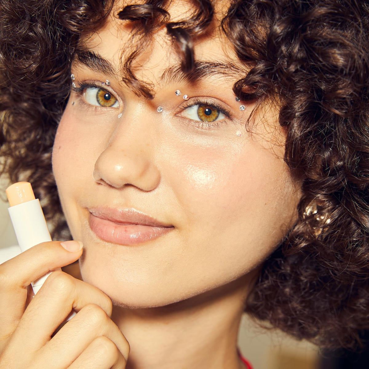 NIVEA balm being applied to lips showing immediate smoothing benefit