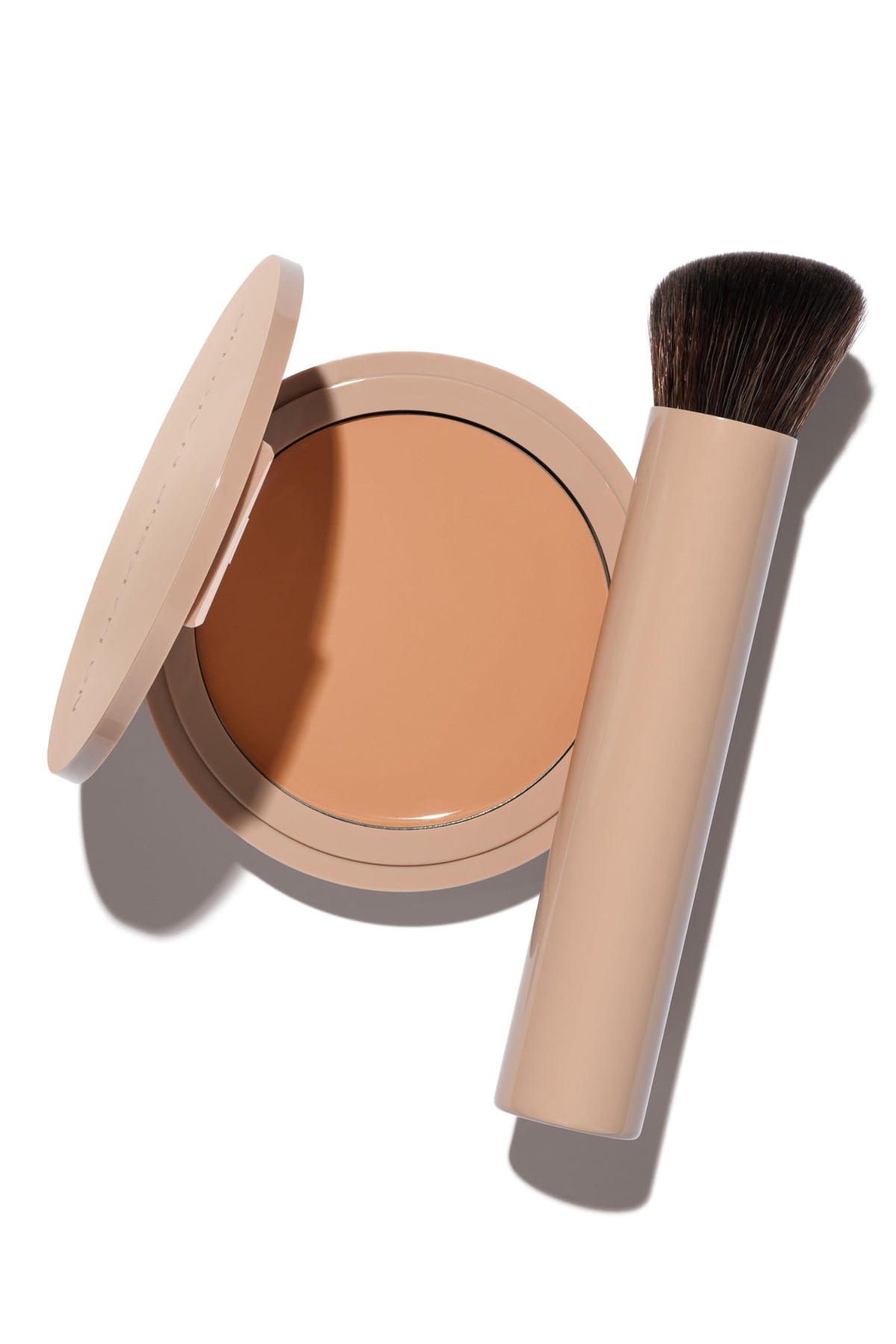 No Makeup Makeup duo front view showing compact packaging and brush, brand delivering versatile coverage