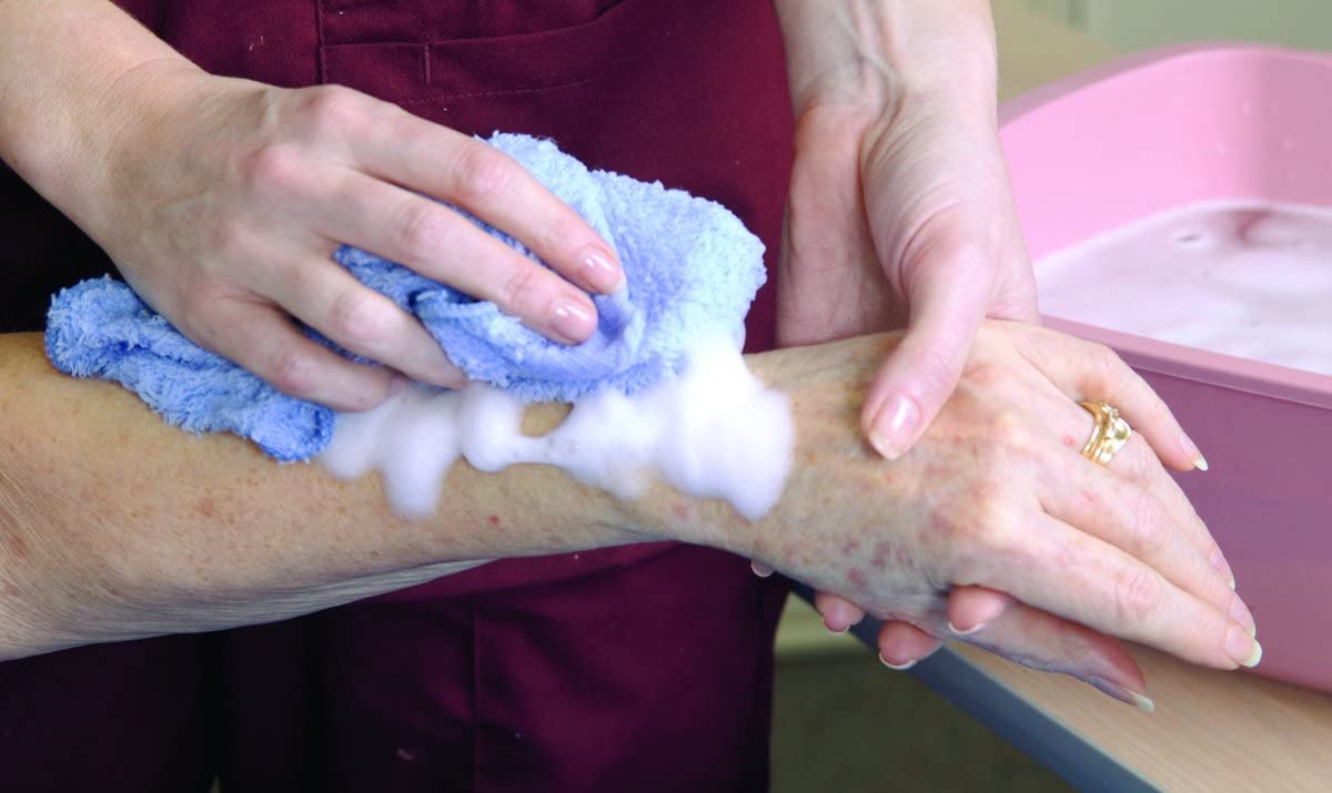 No-Rinse creamy texture on hand demonstrating moisturizing feel and low-residue finish