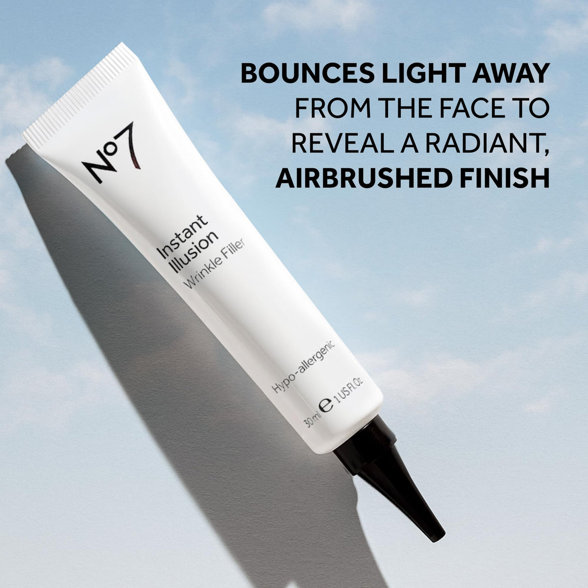 No7 product being tapped into crow's feet illustrating targeted smoothing benefit